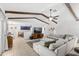 Expansive living room with beams offering a view to the kitchen and dining area at 8308 Granada Blvd, Orlando, FL 32836