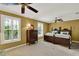 Bright bedroom with twin beds, shuttered windows, and traditional furnishings at 991 Hawthorne Cove Ct, Ocoee, FL 34761