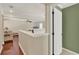Hallway with hardwood flooring overlooking the living area, with stairway at 991 Hawthorne Cove Ct, Ocoee, FL 34761