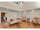Living room boasts high ceilings, an open layout, and warm wood flooring at 991 Hawthorne Cove Ct, Ocoee, FL 34761