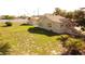 Aerial view of the single story home with large yard, accessory building and fence at 1020 E Main St, Haines City, FL 33844