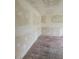 A bare bedroom with a hardwood floor at 1020 E Main St, Haines City, FL 33844