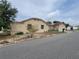 Charming single-story home exterior with a detached garage and street view at 1020 E Main St, Haines City, FL 33844