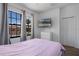 Well-lit bedroom featuring a twin bed, white dresser, and a window providing natural light at 1434 Pacific Rd, Kissimmee, FL 34759