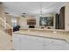 Open concept living area featuring a spacious breakfast bar that looks into the living and dining areas at 1434 Pacific Rd, Kissimmee, FL 34759