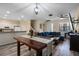 Open-concept living area with a spacious layout, showcasing the living room, dining area, and kitchen at 1434 Pacific Rd, Kissimmee, FL 34759