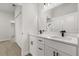 Bathroom features double vanity with quartz counters and modern fixtures at 14905 Sw 39Th Cir, Ocala, FL 34473