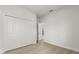 Bedroom with closet and neutral wood-look laminate flooring at 14905 Sw 39Th Cir, Ocala, FL 34473