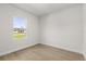 Cozy bedroom with window overlooking backyard at 14905 Sw 39Th Cir, Ocala, FL 34473
