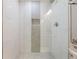 Shower with stylish mosaic tile, a built-in niche, and modern fixtures at 1615 W Gadsen Blvd, Orlando, FL 32812