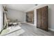 Bright living space with an open concept, wood-look floors, and views to the dining area at 1615 W Gadsen Blvd, Orlando, FL 32812