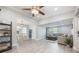 Open concept living room leading into dining room, featuring luxury vinyl plank at 1615 W Gadsen Blvd, Orlando, FL 32812