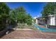 Spacious backyard with brick patio offering a private and tranquil outdoor retreat at 1621 Sunnyside Dr, Maitland, FL 32751