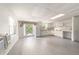 Open-concept layout featuring a kitchen, and a door providing access to the backyard at 1621 Sunnyside Dr, Maitland, FL 32751