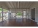 Outdoor patio featuring a screened area and a view of the pool in the backyard at 1621 Sunnyside Dr, Maitland, FL 32751