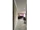 View of the hallway leading to the spacious living room at 1637 Mistflower Ln, Winter Garden, FL 34787