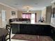 Open concept kitchen with granite countertops and stainless steel appliances at 1637 Mistflower Ln, Winter Garden, FL 34787