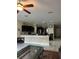 Well-lit kitchen with dark cabinetry and a breakfast bar at 1637 Mistflower Ln, Winter Garden, FL 34787