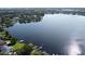 Beautiful lakefront property featuring a dock and expansive water views perfect for boating and recreation at 1653 Cheyenne Trl, Maitland, FL 32751
