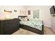 Bedroom featuring dark wood furniture and a leafy patterned bedspread at 1653 Cheyenne Trl, Maitland, FL 32751