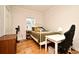 Bright bedroom with hardwood floors, white trim and a cozy atmosphere at 1653 Cheyenne Trl, Maitland, FL 32751
