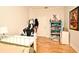 Bright bedroom with hardwood floors and a playful decor, ideal for a  at 1653 Cheyenne Trl, Maitland, FL 32751