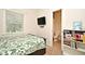 Bedroom featuring carpet, TV, and access to an ensuite bathroom at 1653 Cheyenne Trl, Maitland, FL 32751