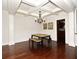 Formal dining room with hardwood floors, coffered ceiling, and chandelier at 1653 Cheyenne Trl, Maitland, FL 32751