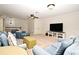 Upstairs living room featuring a tv, denim furniture, and lots of light at 1653 Cheyenne Trl, Maitland, FL 32751