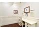 Bright home office featuring wainscoting and built-in desk and storage at 1653 Cheyenne Trl, Maitland, FL 32751