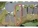 Overhead view of the home, highlighting the property lines, backyard pond, and surrounding landscape at 17319 Million Lakes Ct, Clermont, FL 34714