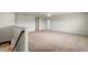 Second floor bonus room with carpet and half wall at 17319 Million Lakes Ct, Clermont, FL 34714
