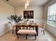 Stylish dining room featuring modern decor and a bright window for natural light at 17319 Million Lakes Ct, Clermont, FL 34714