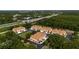 Aerial view of multi-Gathering homes, lush greenery, and easy access to the highway at 2011 Crestdale Ln, Lake Mary, FL 32746