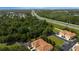 Aerial view of townhouses close to highway, highlighting convenience and community setting at 2011 Crestdale Ln, Lake Mary, FL 32746