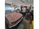View inside this garage shows a pink Mustang and a golf cart at 203 N Sweetwater Blvd, Longwood, FL 32779
