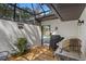 Outdoor BBQ area featuring a grill, cooking space, and access to the pool area at 203 N Sweetwater Blvd, Longwood, FL 32779