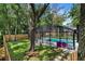 A lovely backyard with a fenced pool is viewed in this image at 203 N Sweetwater Blvd, Longwood, FL 32779