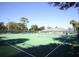 Well-maintained community tennis courts provide residents with an active recreational amenity on a sunny day at 203 N Sweetwater Blvd, Longwood, FL 32779