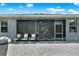 Spacious screened in lanai with patio seating, providing comfortable outdoor living and relaxation at 2319 Dammar St, Orlando, FL 32824