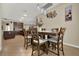 An inviting dining area featuring a wooden table with seating for six, complemented by a decorative wall art display at 2319 Dammar St, Orlando, FL 32824