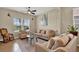 Comfortable living room with neutral tones, plush seating, large windows, and an open, airy feel at 2319 Dammar St, Orlando, FL 32824