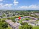 Overhead view of complex highlighting proximity to greenery, lake, and parking at 2550 N Alafaya Trl # 9201, Orlando, FL 32826