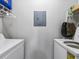 Functional laundry room equipped with a washer and dryer at 2550 N Alafaya Trl # 9201, Orlando, FL 32826