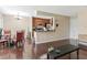 Open floor plan showing kitchen, dining area, and living room at 2550 N Alafaya Trl # 9201, Orlando, FL 32826