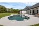 Beautiful pool area with ample seating and sunny backyard at 27071 Moss View Dr, Tavares, FL 32778
