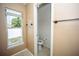 Half bath features tile floors, toilet and window at 302 Cello Cir, Winter Springs, FL 32708