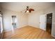 This bedroom features laminate floors, ceiling fan, two windows and neutral paint at 302 Cello Cir, Winter Springs, FL 32708