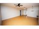 Bright, open living room with hardwood floors and a view to the front door at 302 Cello Cir, Winter Springs, FL 32708