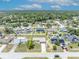 Aerial shot with property lines of home in a residential neighborhood close to a forested area at 3043 Mapleshade St, Deltona, FL 32738